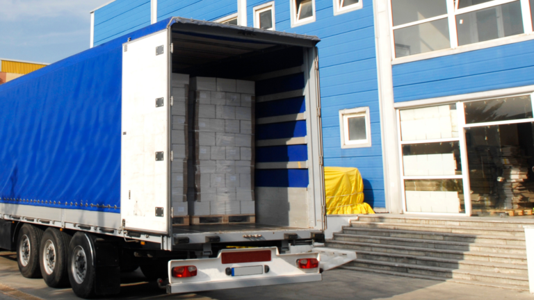 A full container van delivering cargo for a business.